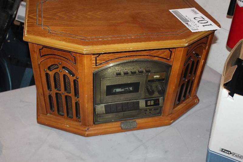 lot 102 image: AMFM StereoCassette TapeCDPhonograph Console