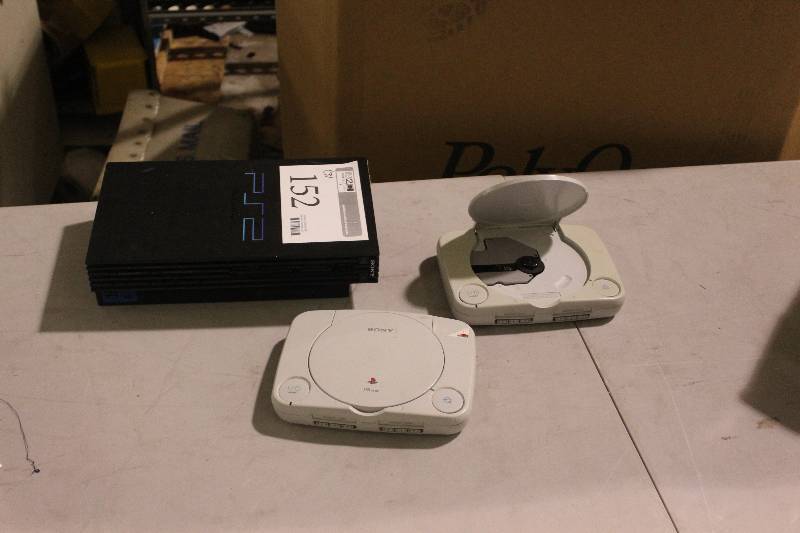 lot 152 image: Lot of (3) Sony Game Consoles Including 2) Sony Playstation AND 1) Sony PS2