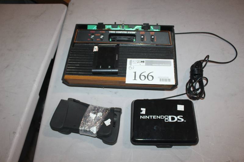 lot 166 image: Lot of (4) Electronics Including 1) Video Computer System AND 1) Game AND 1) Nintendo DS w Case Possible Dropped AND 1) More
