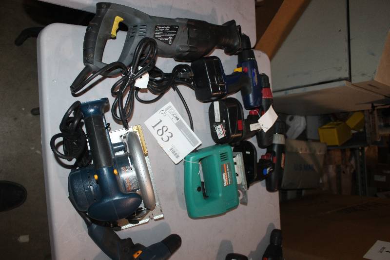 lot 183 image: Lot of (7) Corded and Cordless Power Tools Including Saws Drills Hammer
