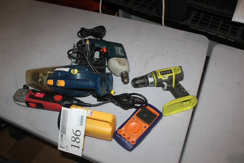 lot 186 image: Lot of (7) Corded and Cordless Power Tools Including Drills Flashlight Vacuum And More