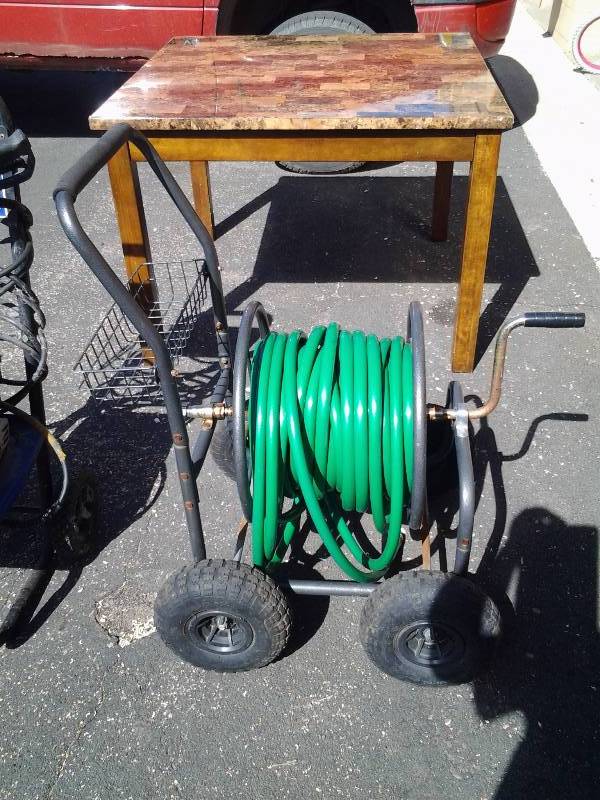 lot 62 image: Heavy Duty Hose Reel With Pneumatic Tires & Hose