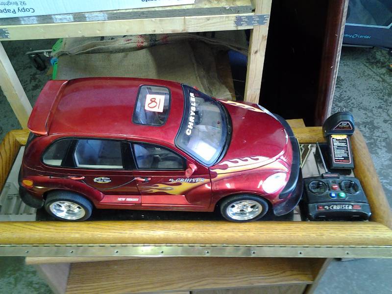 lot 81 image: PT Crusier Radio Control Car With Battery  Charger & Remote-Works