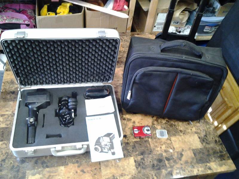 lot 93 image: Rollei E 3LRE Flash Unit With Luna Pro Exposure Meter & Case, Other Padded Rolling Case & Misc