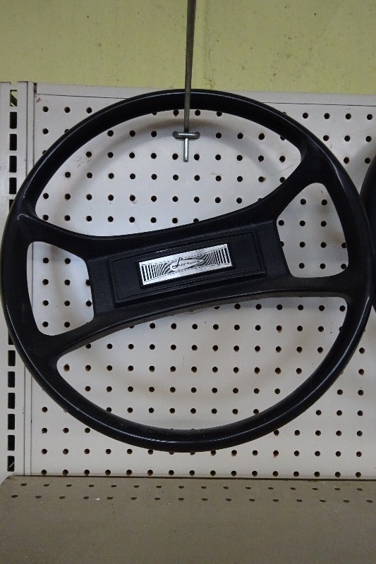Larson boat steering wheel