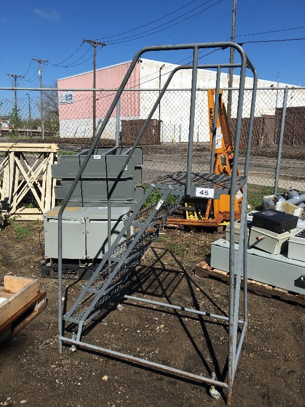 Rolling safety warehouse ladder