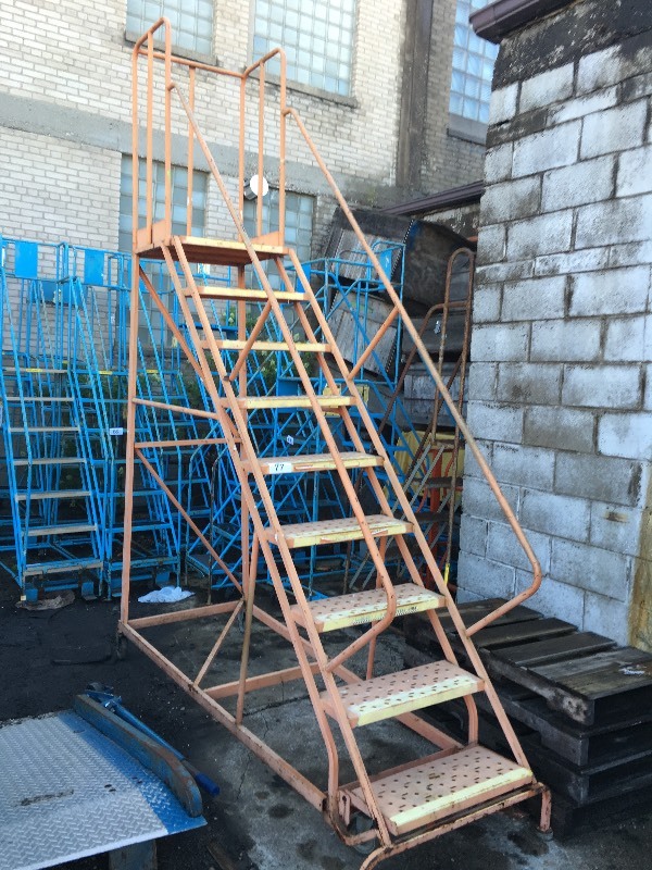 Rolling safety warehouse ladder