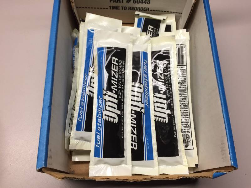 lot 8 image: 19 OPTIMIZERS FUEL TREATMENT PACKS, 2-25 EXTENSION CORDS