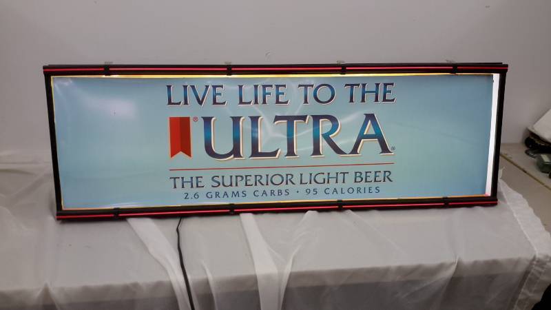 lot 5 image: Live Life to the Ultra sign