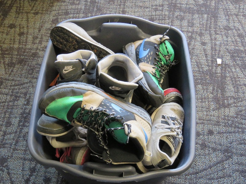 large bin of shoes