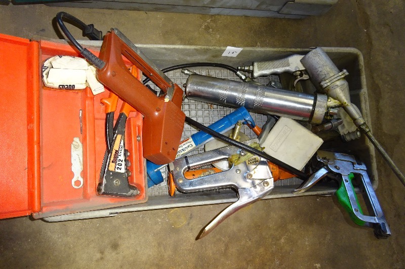 lot 18 image: Grease gun, staplers, caulk gun, ribbet gun