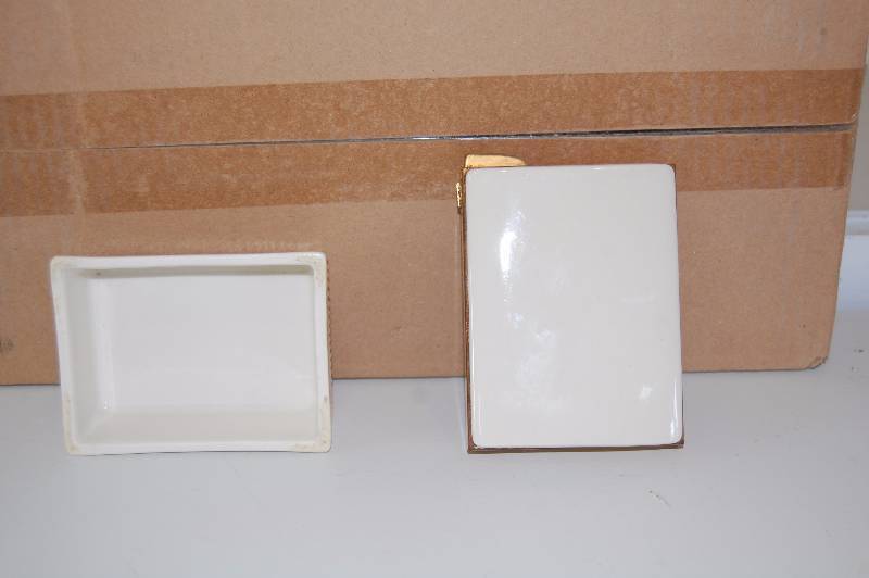 lot 6 image: Antique Cigarette Holder and Lighter