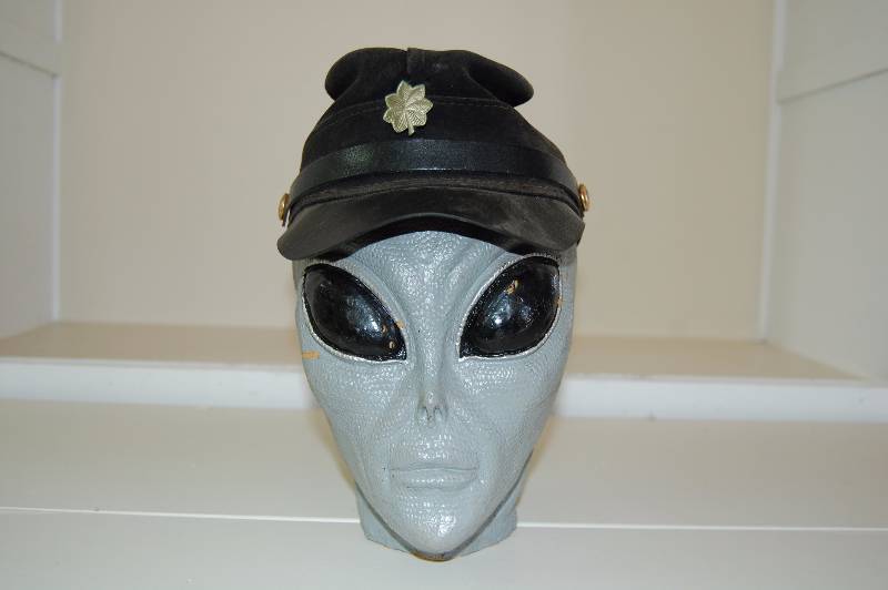 lot 11 image: Leather Hat on Alien Head