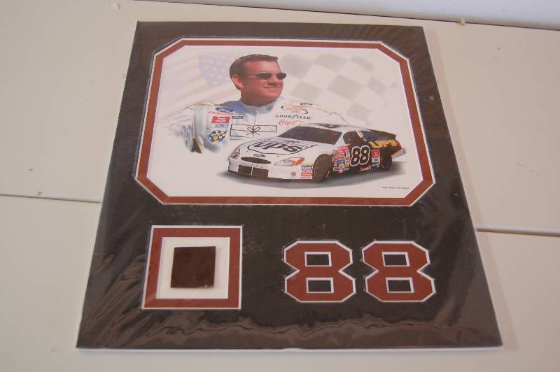 lot 71 image: Piece of Dale Jarretts Nascar Car