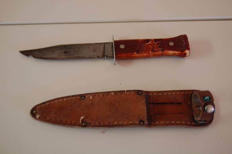 lot 84 image: Knife with Leather Holder