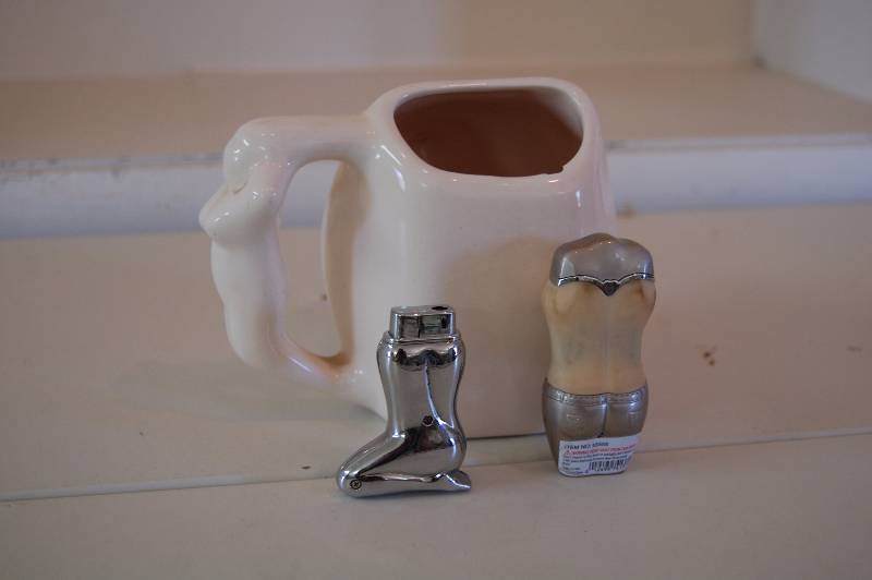 lot 130 image: Mug and Lighters