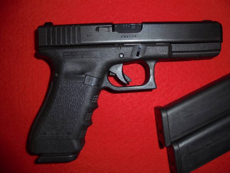 lot 1 image: Glock 37 .45 GAP with 3 Mags (10 rds each)