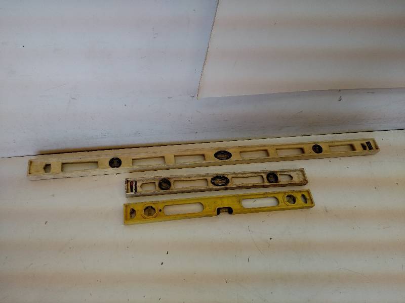 lot 57 image: (3) Levels...