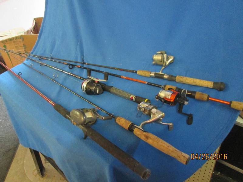 Five fishing poles with reels for e...