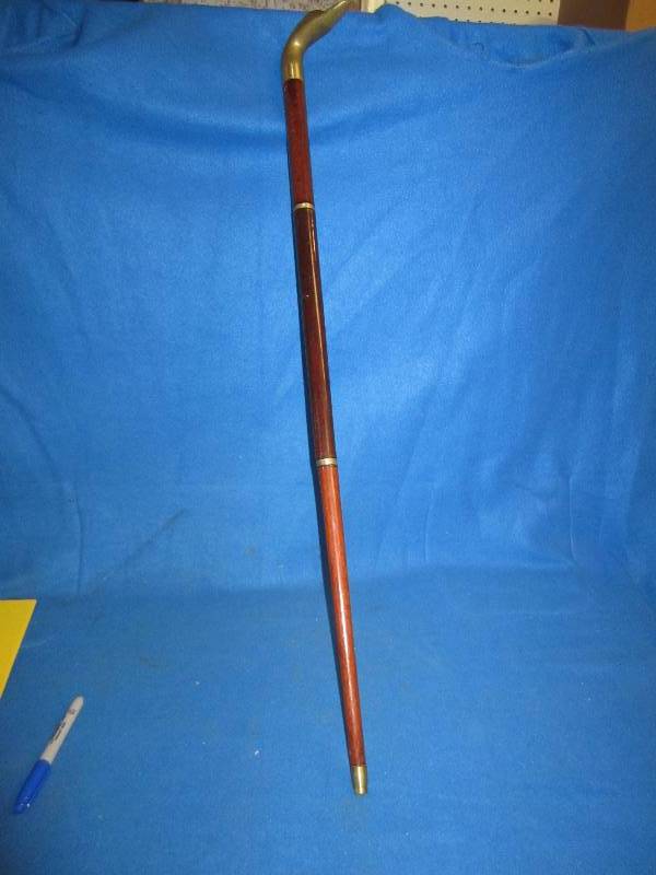 Metal topped duck cane...