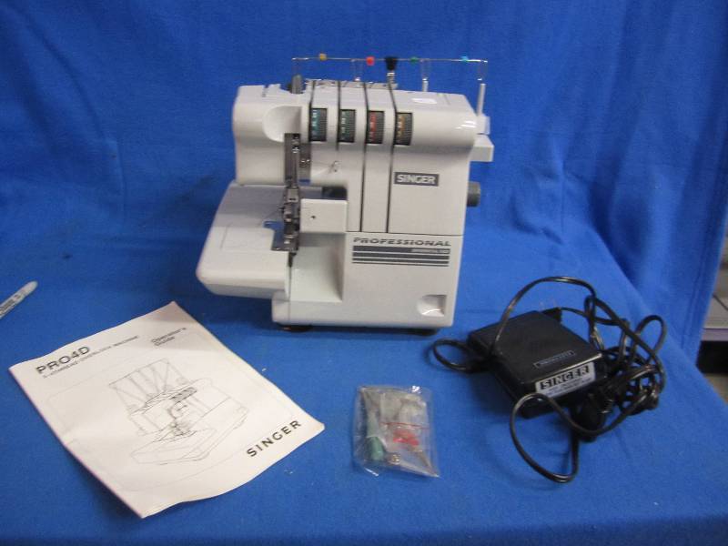 Singer Serger machine with pedal, p...