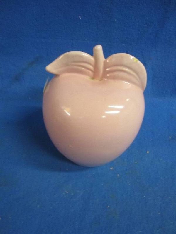 Pink glass apple with open top...