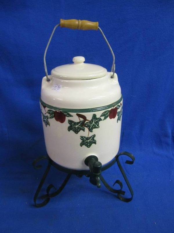 Pot with serving spout and stand...