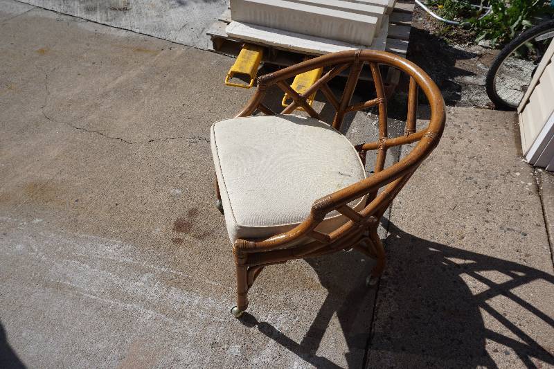 lot 26 image: Set of 4 - Wicker Wheeled Padded Patio Chairs
