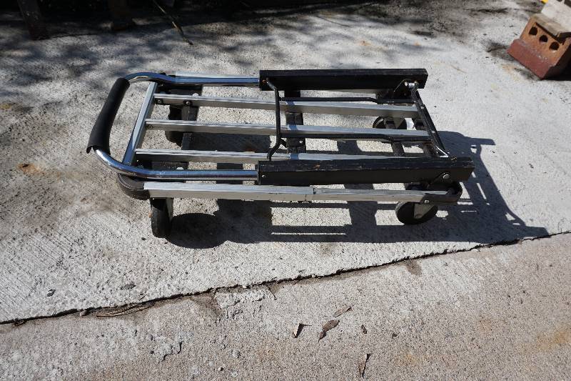 lot 24 image: Metal Wheeled Utility Cart With Fold Down Handle