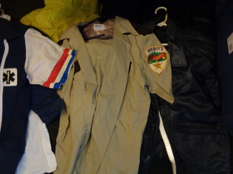 lot 117 image: Large Lot of EMT, Firefighter, and Sheriff Uniforms