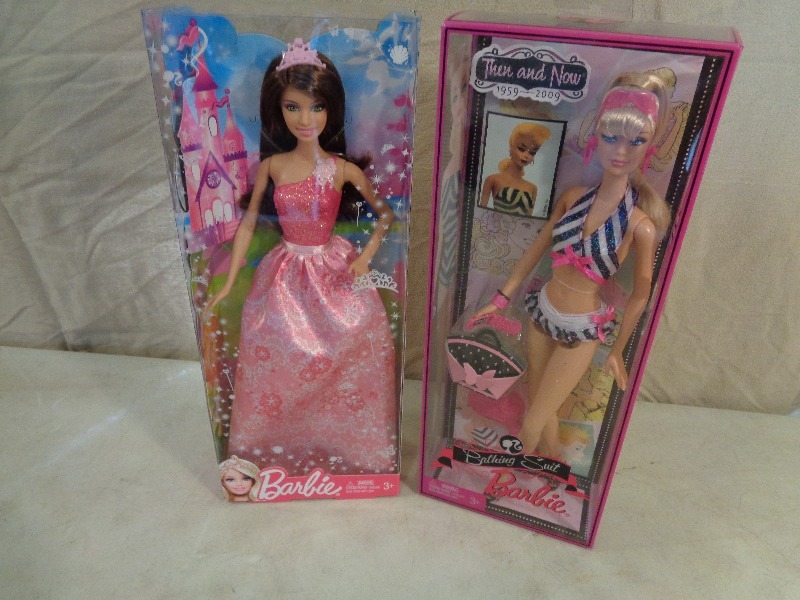 lot 65 image: 2 New Barbies in Boxes