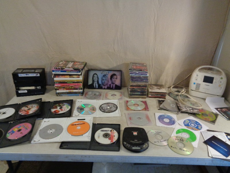 lot 115 image: Dvds, Cds, and More