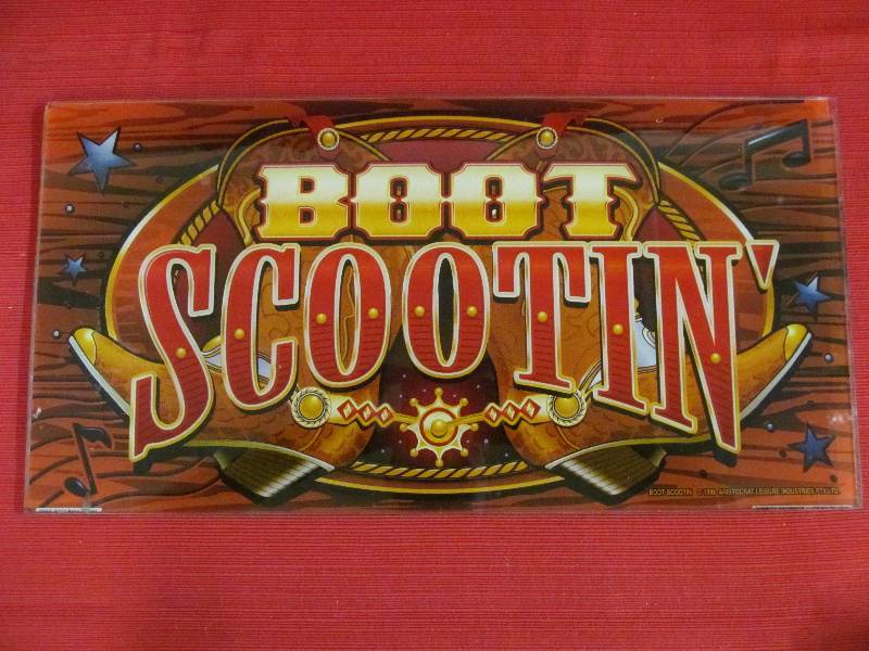 lot 83 image: Slot machine glass