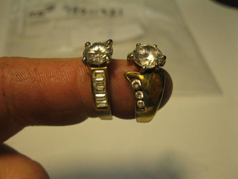 lot 162 image: 2 rings, 1 says 18 KT