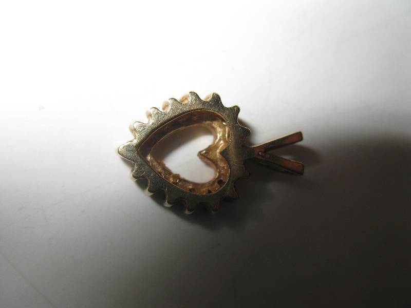 lot 183 image: Gold heart shaped pendant wsmall stones