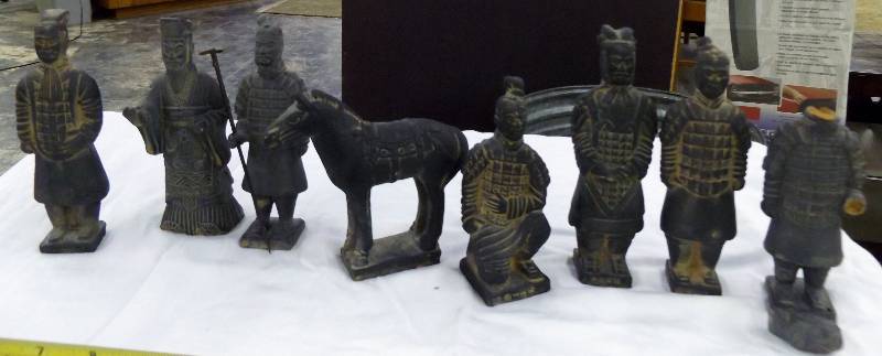 8 oriental figurines, some damage, see pictures. One has head broken.