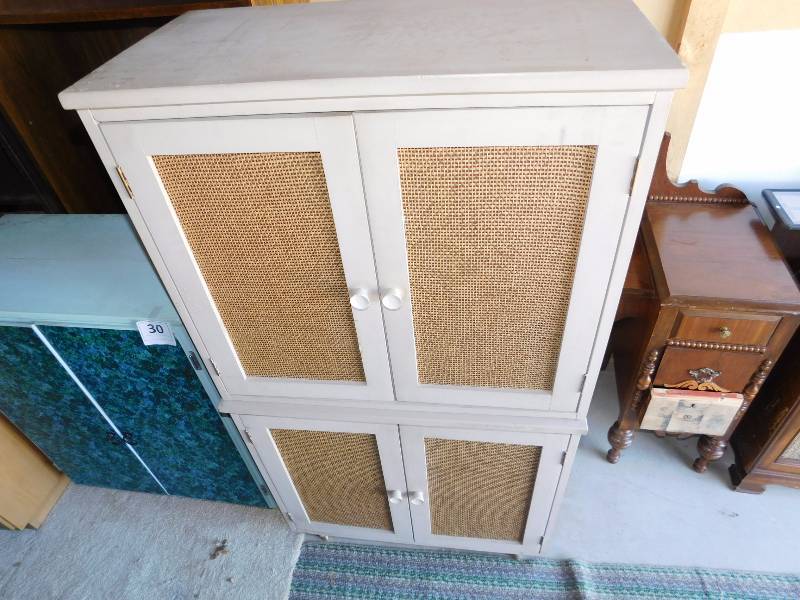 2 cabinets each has 2 doors and shelves