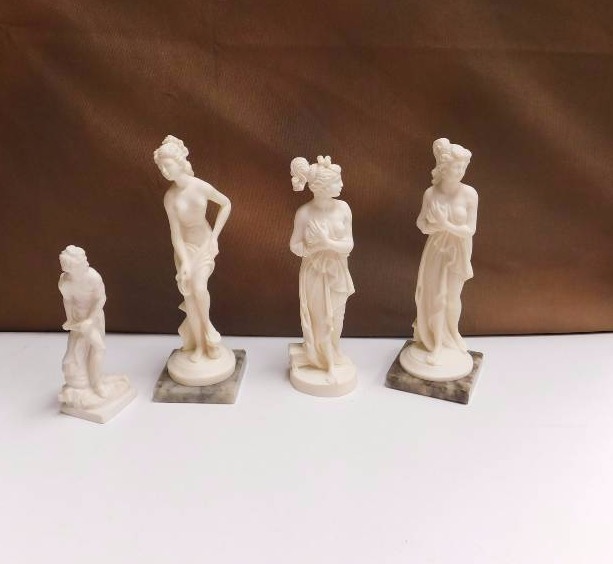 4 roman statuary figurines