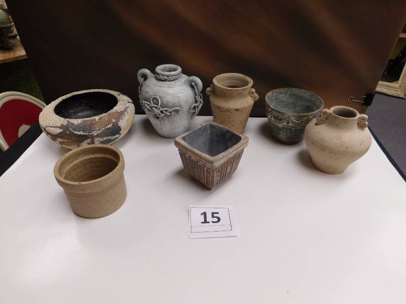 several pottery pieces many shapes, styles and sizes