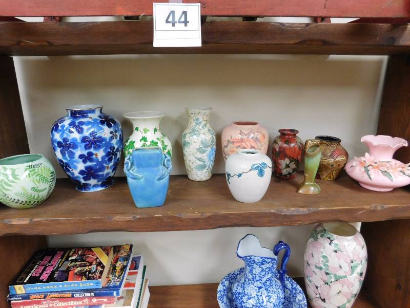 Shelf lot of vases some hand decorated