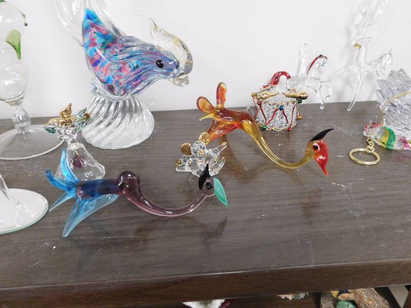 shelf lot of glass figurines