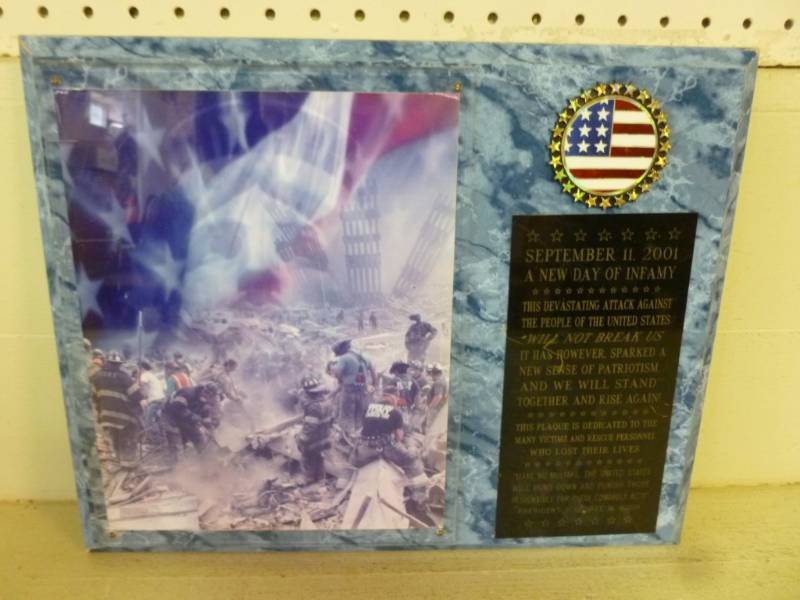 lot 206 image: 911 Wall Plaque