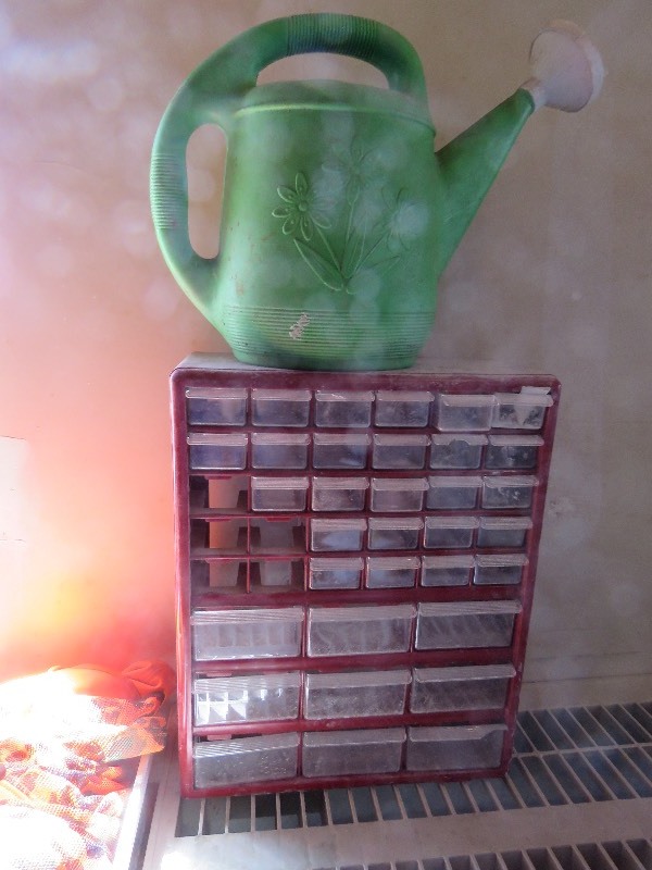 Water can and garage organizer