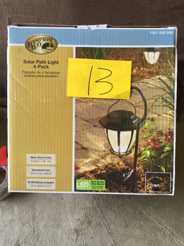 lot 13 image: Hampton Bay Outdoor Solar Powered Landscape LED Matte Black Hammered Plastic Lens and Sheppards Hook Path Light (4-Pack) New Model # 29603
