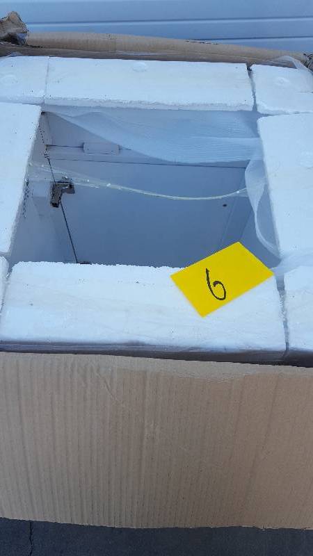 lot 6 image: FEBO Cabinets 24 in. Vanity Cabinet Only in White  New