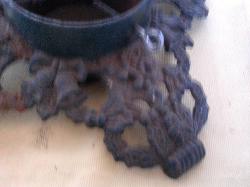 lot 13 image: ANTIQUE IRON CHRISTMAS TREE STAND