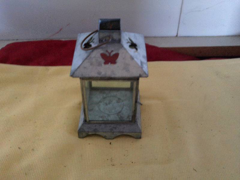 lot 22 image: METAL OUT SIDE HANGING CANDLE HOLDER