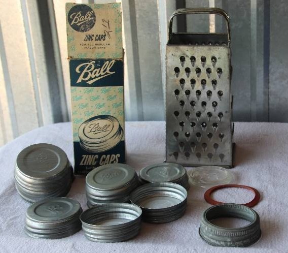lot 40 image: Zinc Ball Lids, Glass Ball Jar Lid & Box Grater