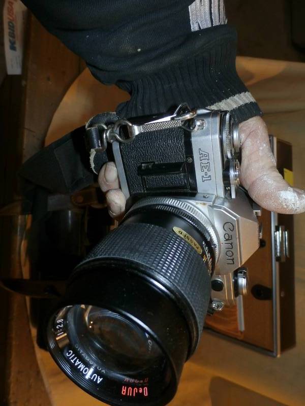 2 CANON EA1 Cameras.with nearly everything you would ever need 
