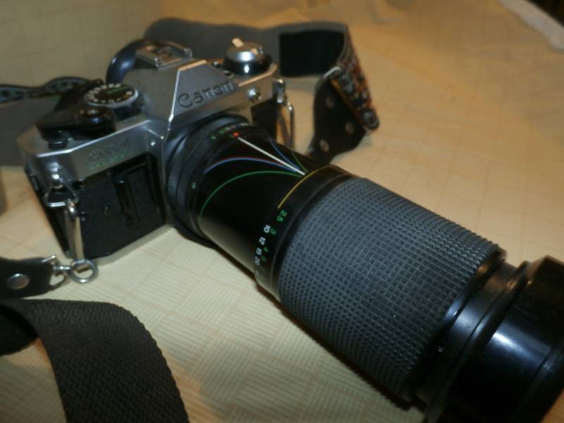 CANON EA1 Camera.with telescopic lens 